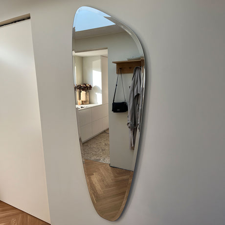 Asymmetrisk spejl med facetkant